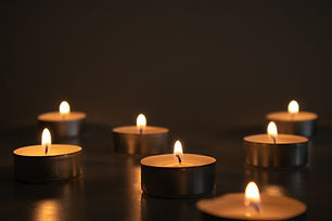 bigstock-Seven-Small-Lighted-Candles-In-